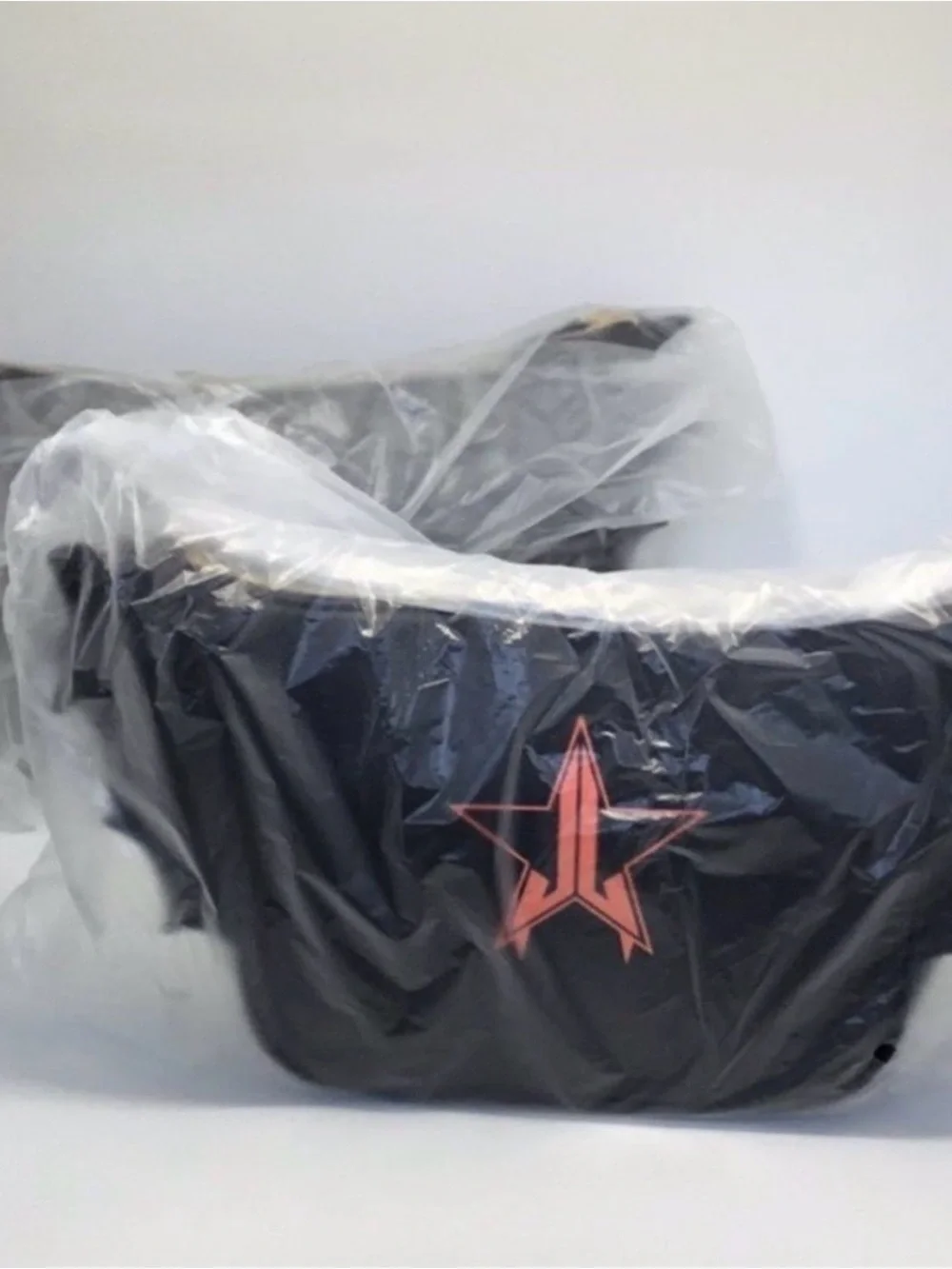 Jeffree Star Black Cosmetic Bag with Rose Gold Star Logo
